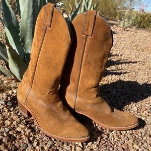 Woman’s tan Suede cowgirl boots